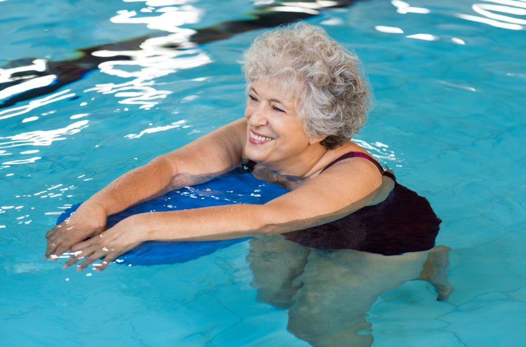 a woman swimming in a pool